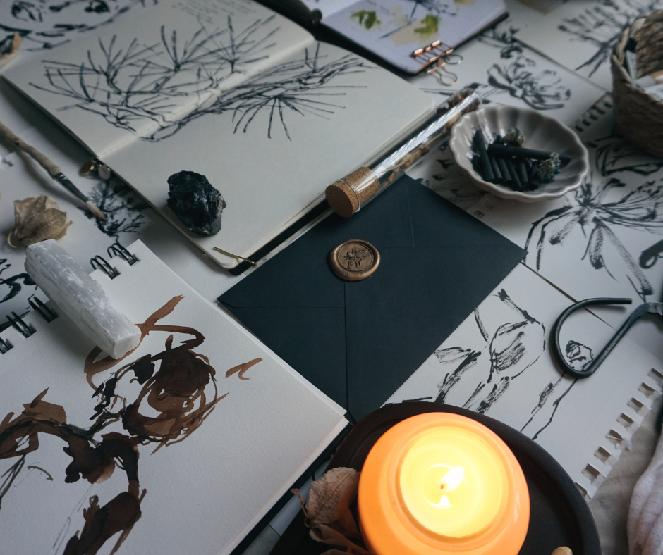 artist table with black and white sketches